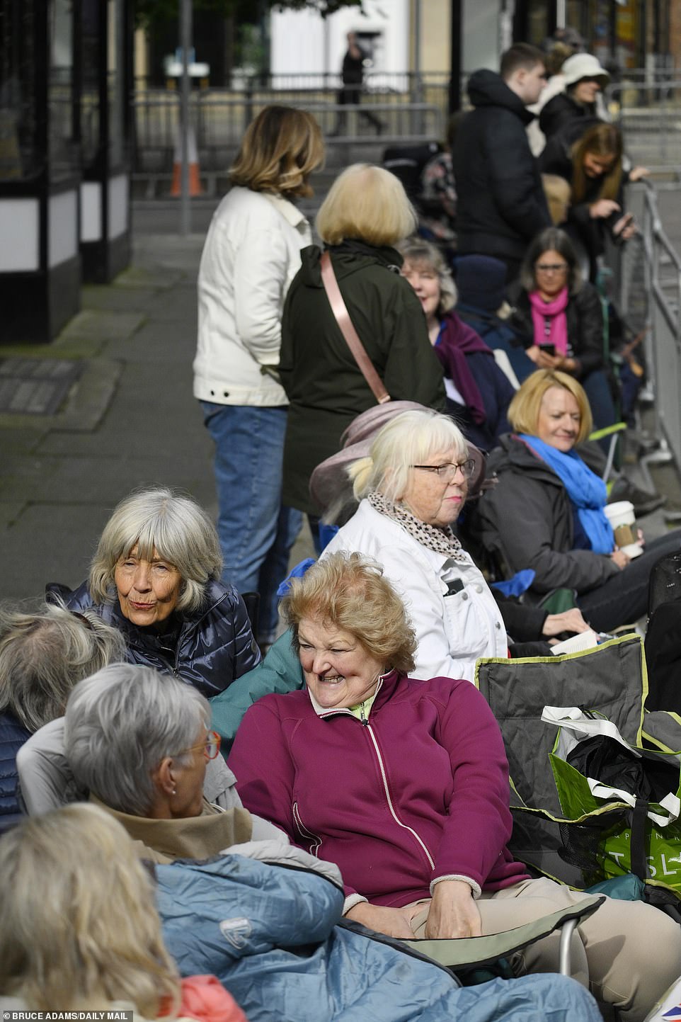 Crowds gather outside Chester Cathedral for the society wedding starting at midday