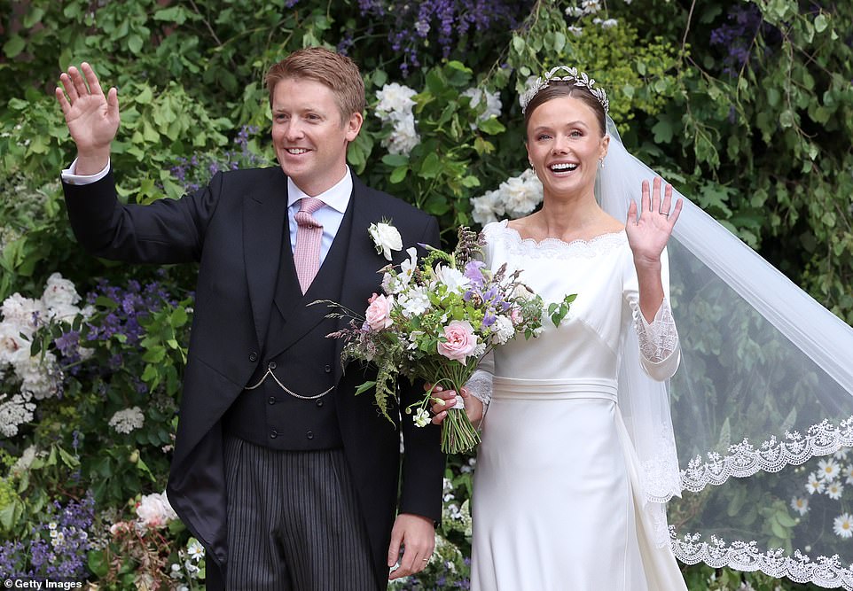 The bespoke embroidery design on the bride's gown and veil was hand drawn by Emma Victoria Payne, featuring floral motifs and edgings from the Olivia's great great grandmother's veil from around 1880. The bride is wearing the Faberge Myrtle Leaf Tiara made for Grosvenor brides to wear on their wedding day. It has been in the Grosvenor family since its creation in 1906. Olivia's bouquet was made of flowers picked from the gardens of the duke's family home, Eaton Hall.