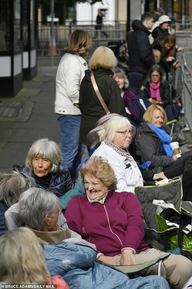 Crowds gather outside Chester Cathedral for the society wedding starting at midday