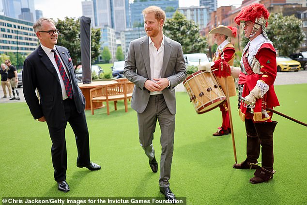 TUESDAY: Invictus Games Foundation chief executive Dominic Reid and Prince Harry at the Honourable Artillery Company in London