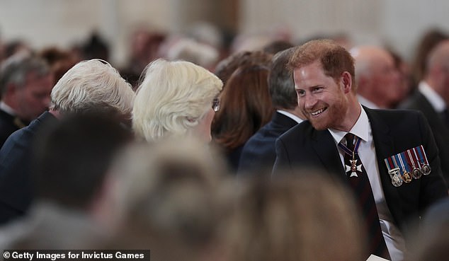 Harry was seen speaking to his uncle, Charles Spencer, after arriving at the service on May 8