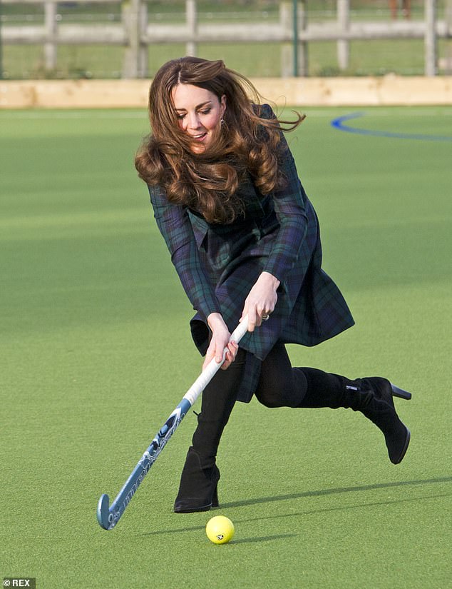 Kate got stuck in with a game of hockey at her old prep school, St Andrew's in Berkshire, in November 2012