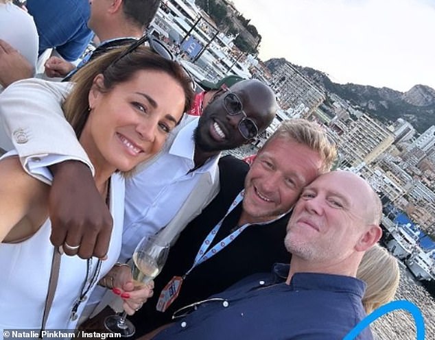 Natalie Pinkham (left) donned a vibrant white suit with wide legged trousers and a fitted waistcoat