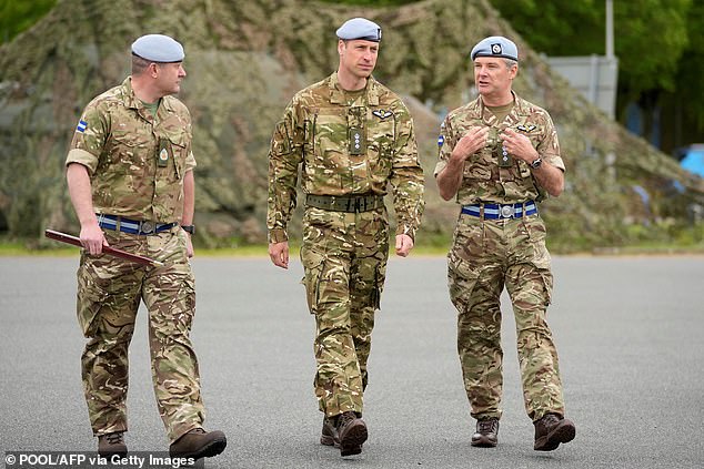 Prince William speaks to service personal at the Army Aviation Centre in Middle Wallop today