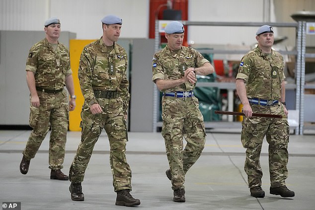 Prince William speaks to service personal at the Army Aviation Centre in Middle Wallop today