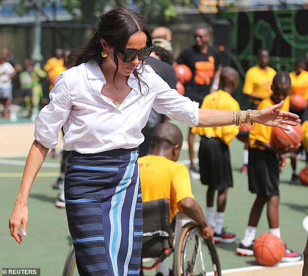 Meghan appeared to be wearing an outfit made of aso oke - a hand-woven cloth from south-west Nigeria - which she had been gifted at a lavish lunch yesterday