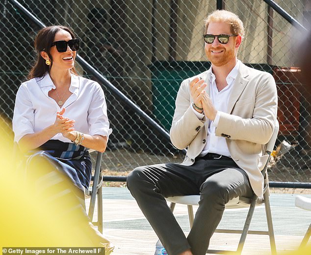 Harry looked stylish in a white shirt and casual beige blazer, which he paired with loafers and dark sunglasses