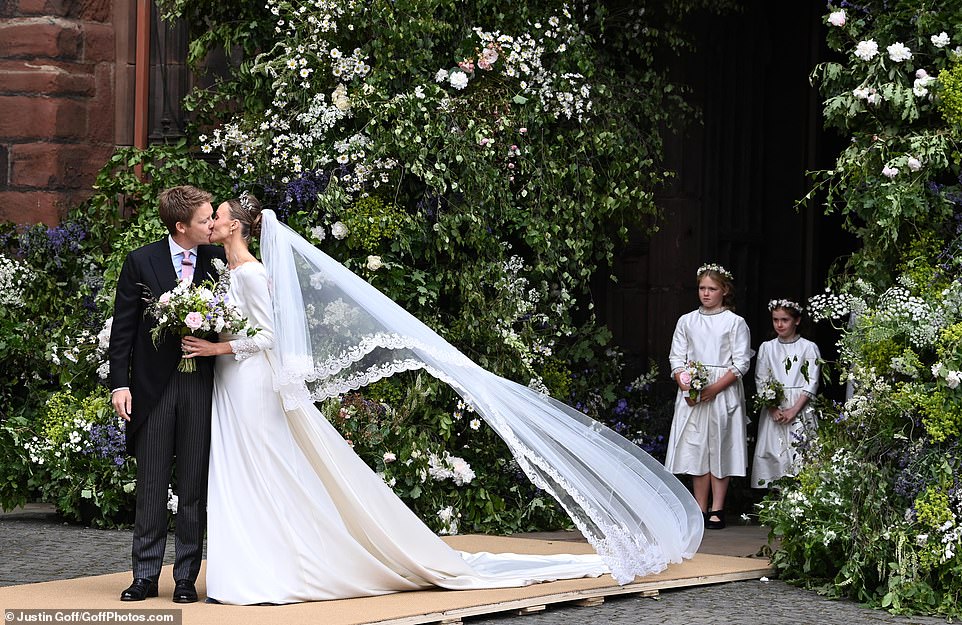 The Duke of Westminster and Olivia Henson shared a kiss after their society wedding ceremony at Chester Cathedral. Prince William , who was an usher at the lavish ceremony, smiled alongside his friend William van Cutsem as they left the historic cathedral in Cheshire for the nuptials of his old friend Hugh Grosvenor. The 7th Duke, 33, universally known as 'Hughie' to aristocratic friends, is estimated to be worth £10.42billion ($13.2bn), making him the richest man under 40 in Britain.