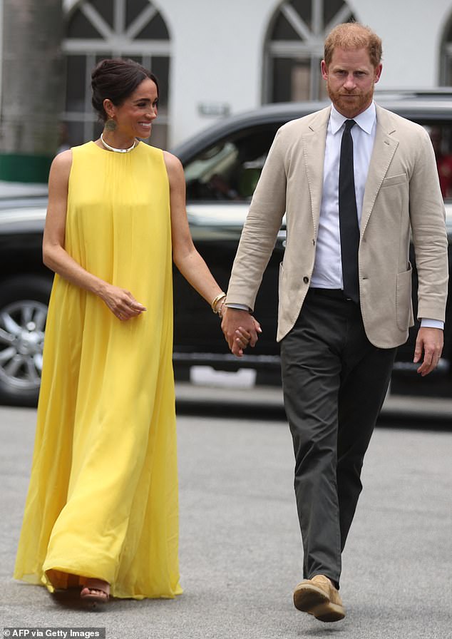 Pictured: The Duke and Duchess of Sussex arrive at the State Governor House in Lagos during their three-day visit to Nigeria