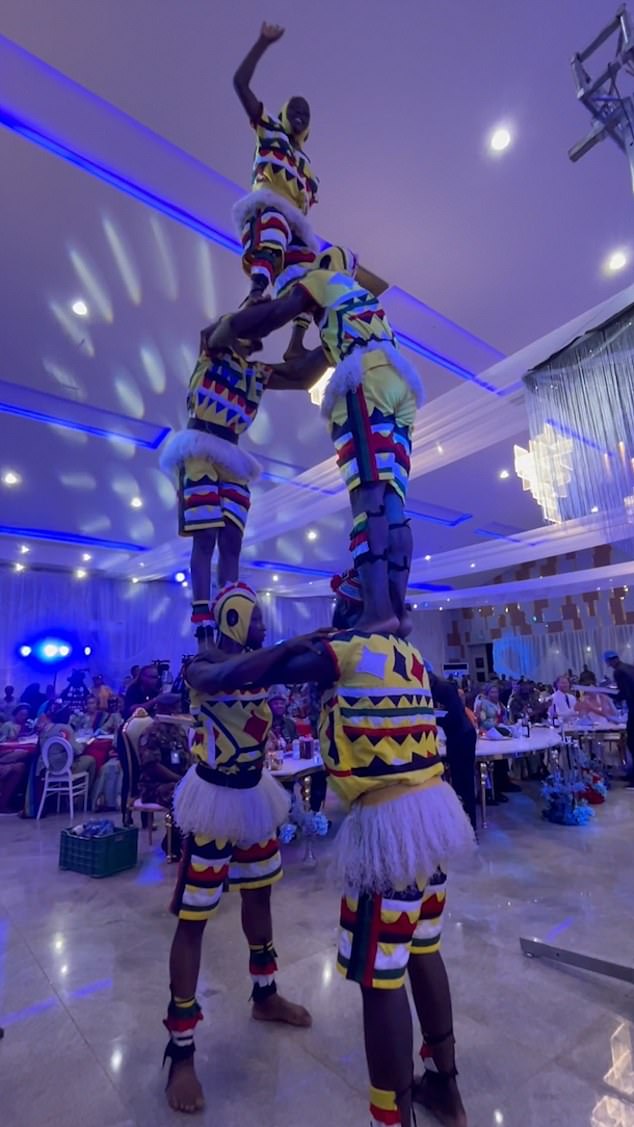 In an amazing feat of strength the dancers were able to scramble on top of each other's shoulders and form a human pyramid, wowing crowds who watched on in awe