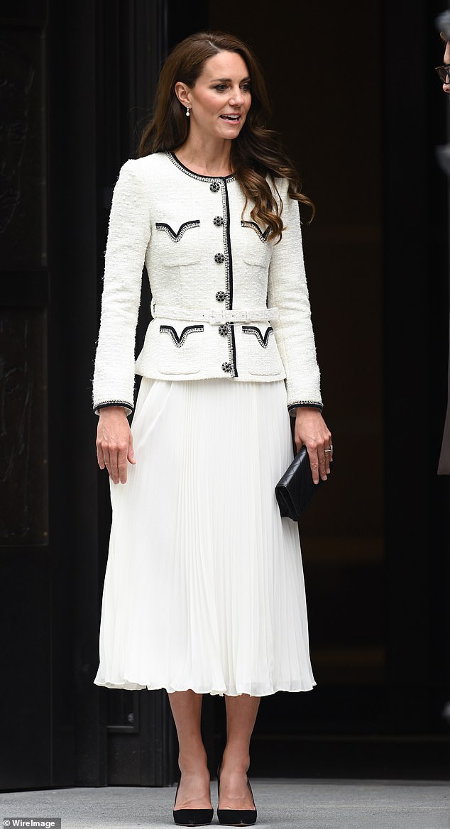 For the reopening of the National Portrait Gallery in 2023, the Princess of Wales opted for an elegant black and white blazer dress from Self-Portrait. This 2-in-1 dress is Kate's shortcut to a polished look when achieving her trademark tailored style, and she teamed the intricately detailed piece with a Chanel black quilted clutch bag