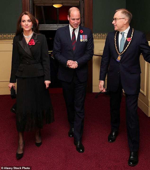 For the Royal British Legion's Festival of Remembrance at the Royal Albert Hall in November 2022, Kate chose a black version of her favourite silhouette. The royal had previously worn the same dress in white. She dipped into the late Queen Elizabeth's jewellery collection, choosing  a sentimental pair of pearl drop earrings and a four-strand pearl and diamond choker