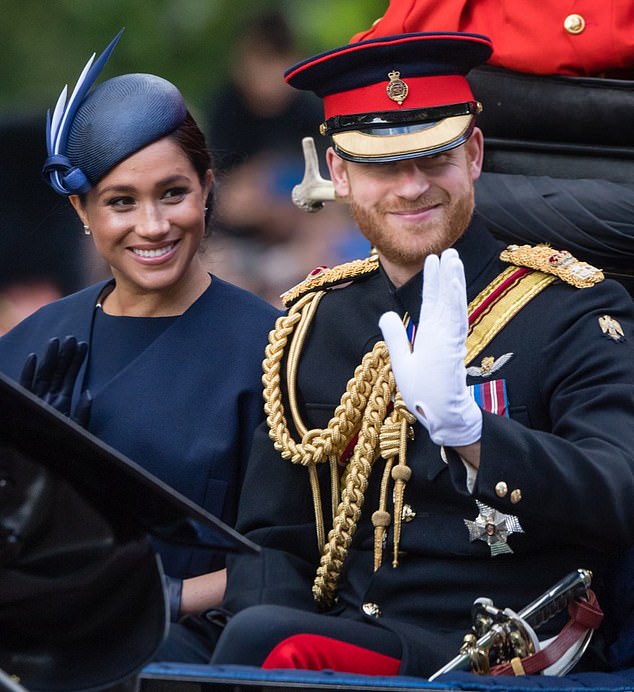 Prince Harry (pictured with Meghan) was 'stunned' by the backlash he faced after being nominated for the award