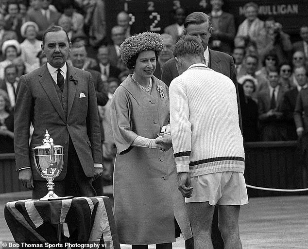 In 1962, when she handed the men's singles trophy to Rod Laver, Queen Elizabeth wore a decidedly more grand diamond brooch than her floral one from 1957, alongside her triple strand pearls. Queen Mary's Lover's Knot Brooch was bequeathed to her following her grandmother's death