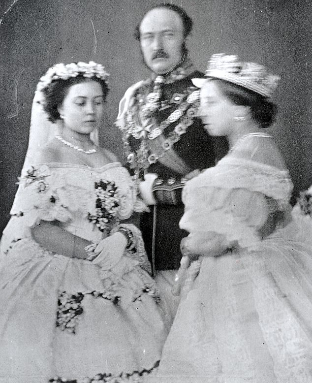 The royal tradition of carrying a sprig of myrtle in royal wedding bouquets started with Princess Victoria, the eldest daughter of Queen Victoria. Above: Victoria, the Princess Royal, seen holding a sprig of myrtle on her wedding day in January 1858 with her parents, Queen Victoria and Prince Albert