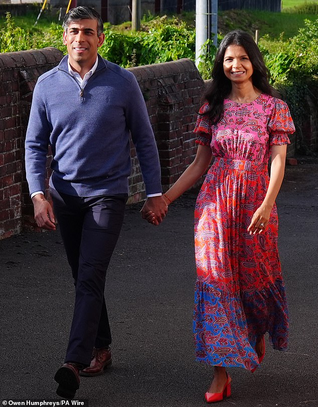 Rishi Sunak and his wife Akshata Murty arrived to cast their vote at Kirby Sigston Village Hall in Northallerton, North Yorkshire, this morning