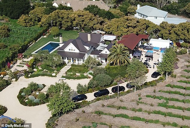 Production trucks and tents lined the driveway of the $5million property set in eight acres of avocado and lemon groves in a gated community in Montecito