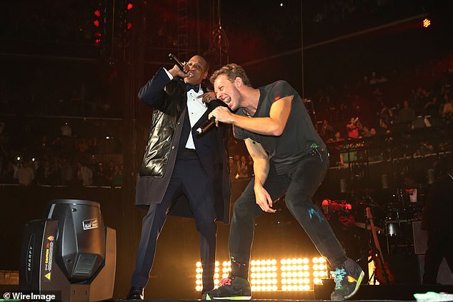 Pictured: Jay-Z (left) performing with the lead singer (right) at the Barclays Center in New York in 2012