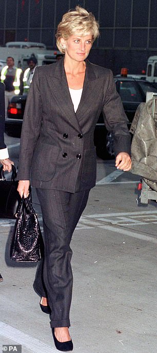 Diana pictured at Heathrow Airport before flying to New York to meet Hillary Clinton