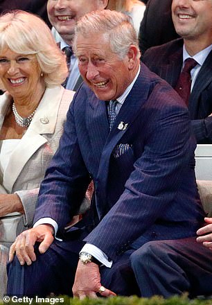 The rare Parmigiani Fleurier 'Toric Chronograph' that has remained a firm favourite of His Majesty over the years. Above: Charles wearing the watch at the opening ceremony of the Invictus Games in 2014