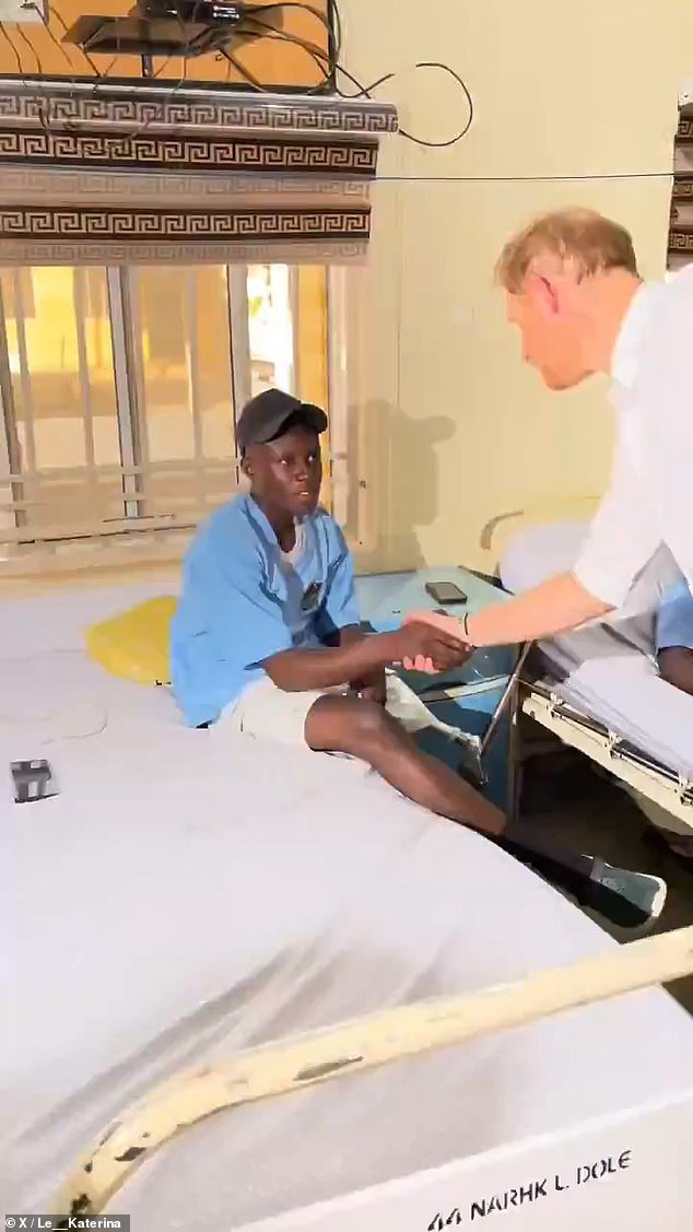 Harry shook hands with 50 injured service personnel while visiting a military hospital in Kaduna