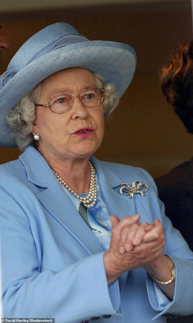 Essie's Ballet Slippers nail varnish was 'the only colour Her Majesty would wear'. Above: The Queen with her nails on display at Newbury in 2005