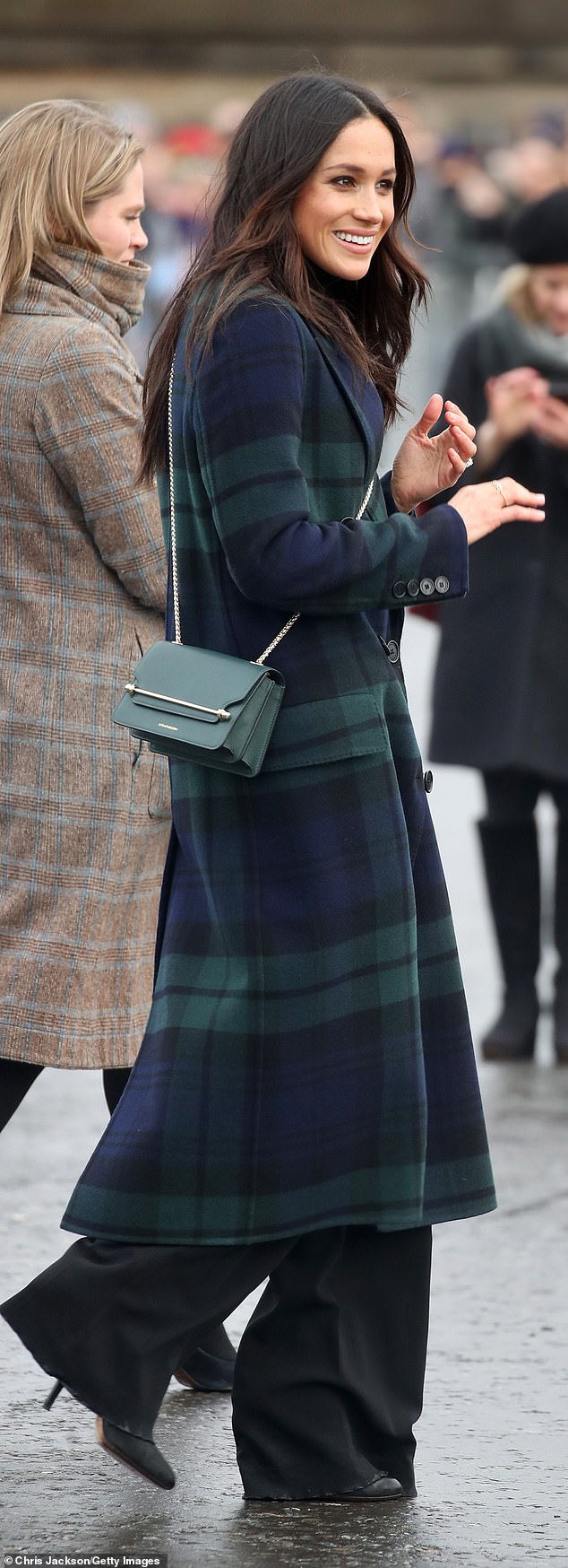 Dating back to 2019, the Duchess wore long black trousers that trailed along the floor in Edinburgh