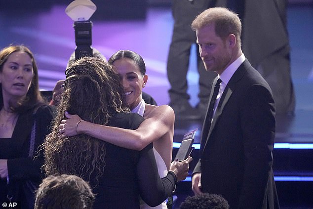 The Duchess of Sussex was embraced as she and her husband Prince Harry arrived at the Dolby Theatre in Los Angeles for the 32nd ESPY Awards