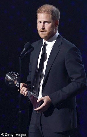 Harry accepted the award at the ceremony despite critics having called for him to turn down the honour - while an online petition was set up condemning the prize