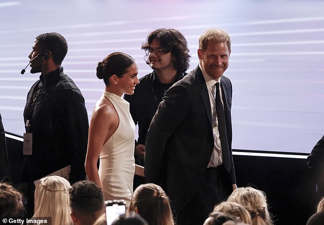 Meghan, Duchess of Sussex and Prince Harry, Duke of Sussex are seen during the 2024 ESPY Awards at Dolby Theatre