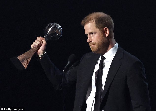 The Duke of Sussex raised the trophy in the air to the crowd of veterans and A-listers