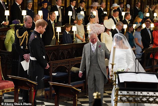 Princes Charles walked Meghan down the aisle of St George's Chapel in Thomas's absence