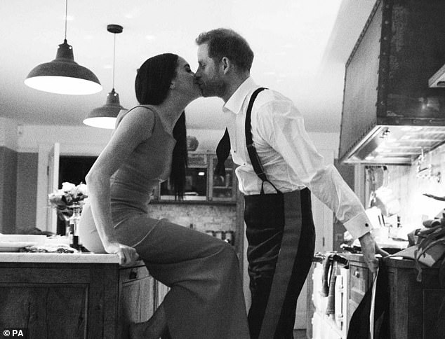 The couple shared a kiss in the kitchen after arriving home from the Mountbatten Festival of Music in March 2020