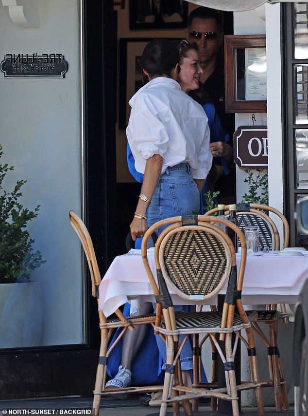 Kimberly and Meghan bid the restaurant farewell. Their outing came as news broke of Joe Biden stepping down as President