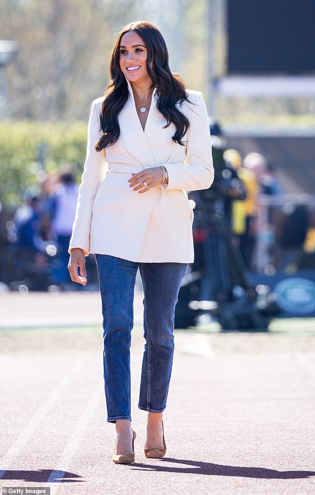 On day two of the Invictus Games in 2020, Meghan wore slim leg denim, a Brandon Maxwell blazer and heeled Manolo Blahnik pumps. It was a more grown-up version of her original Invictus Games ensemble in 2017