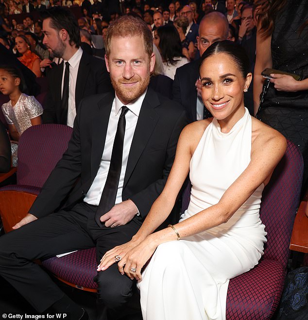 Meghan Markle beamed with pride as Prince Harry readied to win a prestigious military award at the ESPY Awards