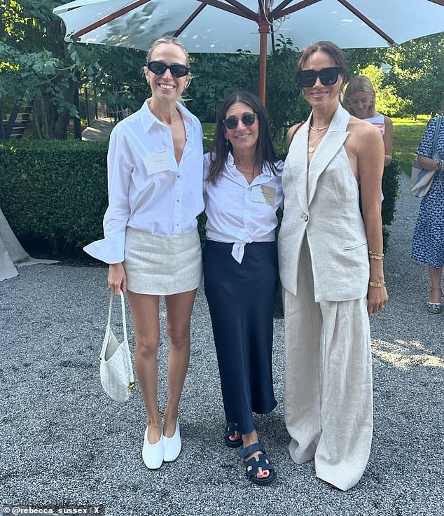 The Duchess of Sussex, seen here alongside designer Misha Nonoo and cosmetics owner Bobbi Brown, wore a vest and trousers combo by Revolve, which retails for around $870