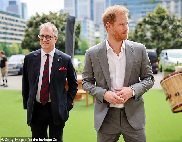 Prince Harry thanked Dominic Reid (left) for his 'relentless service' after 10 years working for Invictus Games in a heartfelt statement on Friday