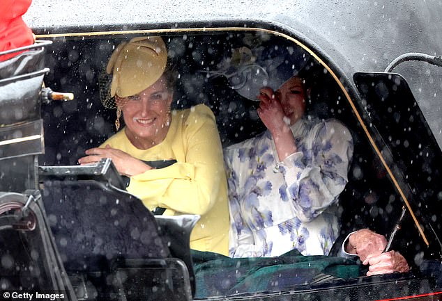 Sophie, Duchess of Edinburgh and Lady Louise Windsor ducked under the cover of their carriage