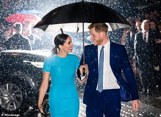 Samir Hussein managed to snap a stunning photograph of the Duke and Duchess as they stepped out arm-in-arm underneath an umbrella