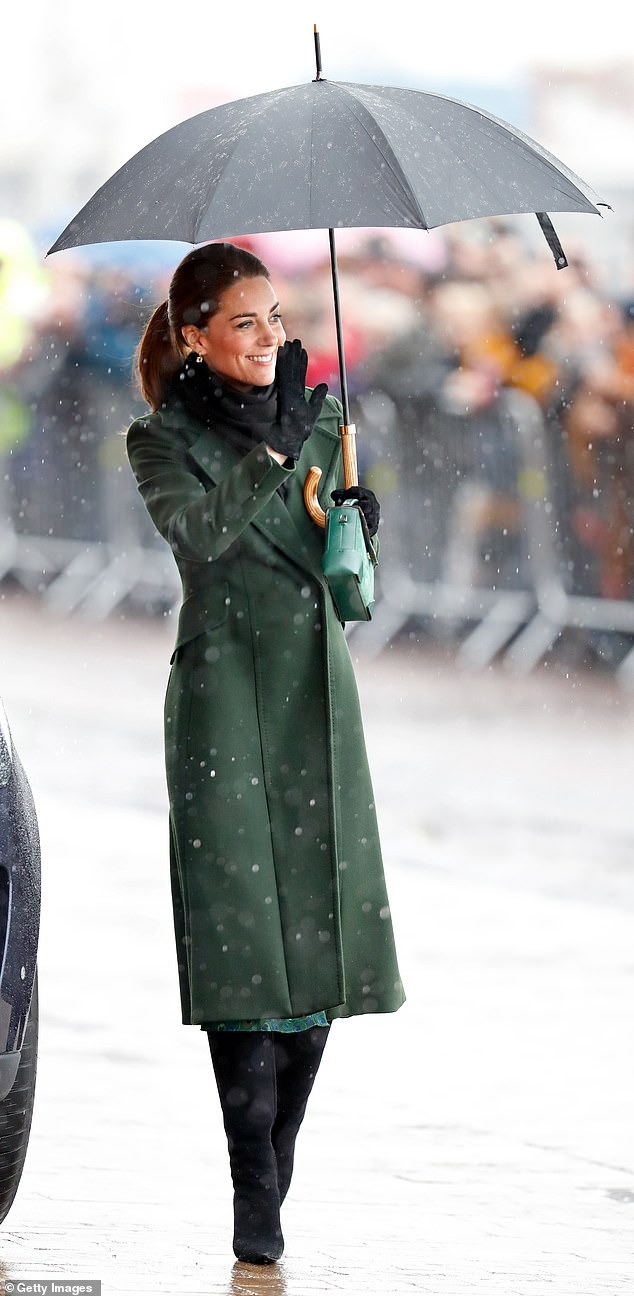 Kate visited Blackpool in 2019 and had to take cover under an umbrella as she waved to crowds