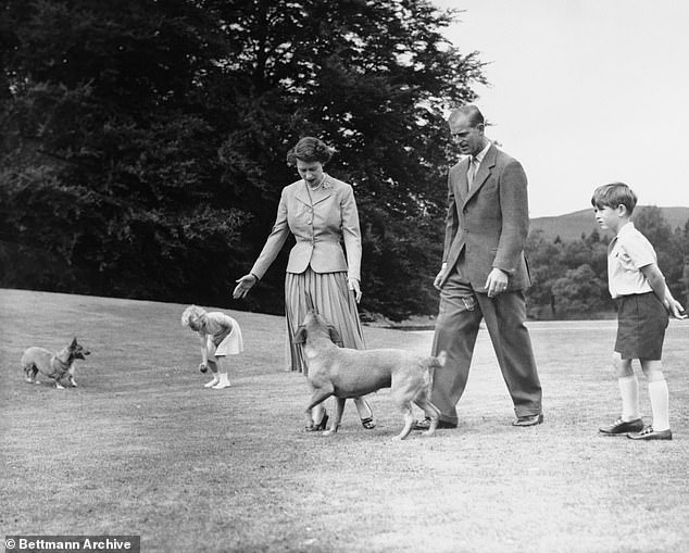 Queen Elizabeth in the grounds of Balmoral with Prince Philip, Charles and Anne in 1955