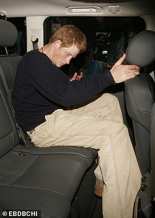 Party prince: Harry looks the worse for wear on a night out in 2006