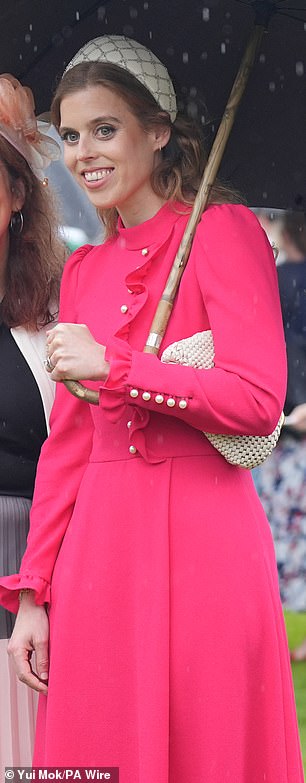 Princess Beatrice accessorised with the must-have bag during a Buckingham Palace garden party in May