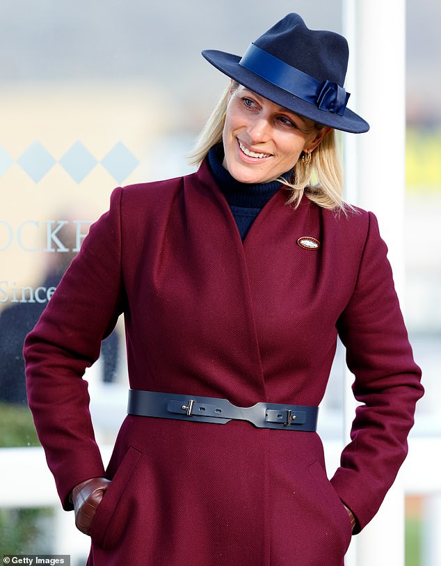 Zara appears nonchalant at Cheltenham Racecourse, keeping her gloved hands in her pockets, January 2024