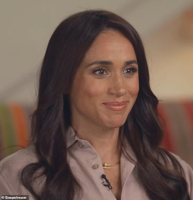 'Our kids are young - they're 3 and 5. They're amazing,' Markle said, flashing a smile. 'But all you want to do as parents is protect them - so as we can see what's happening in the online space, we know that there's a lot of work to be done'