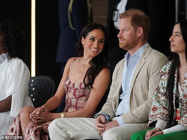 She styled her hair into loose waves after her earlier up-do - for her second look of the day