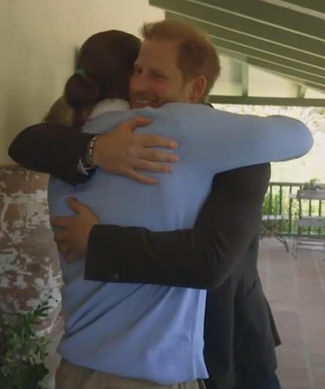 Anchor Jane Pauley described the new project as a 'modest beginning', to which Meghan said they 'had to start somewhere'. (Pictured: Prince Harry embraces a member of The Parents' Network)