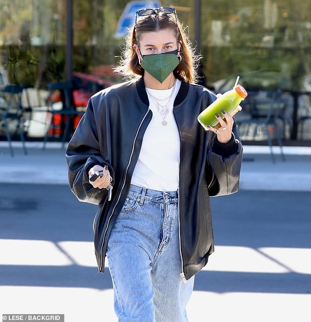 It-girl Hailey Bieber dressed down the glittering accessory on a green juice run in January 2022, pairing her $10,000 pink tennis necklace from Jennifer Meyer with a pair of baggy blue jeans and an oversized leather jacket