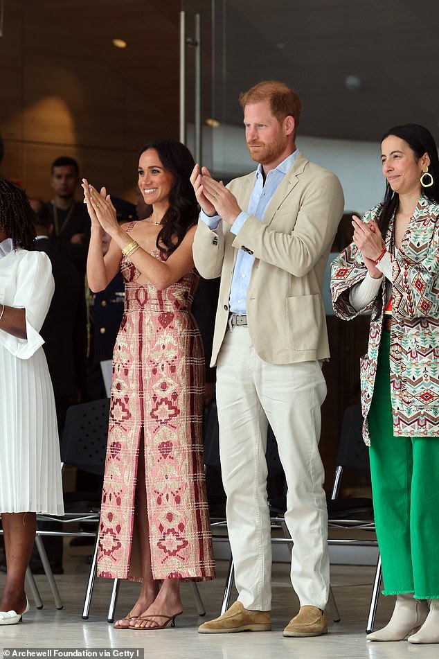 Harry and Meghan at Centro Nacional de las Artes Delia Zapata in Bogota. Johanna Ortiz dress, £1,595; necklace, Cartier, £12,800; watch 'Tank Francaise' Cartier, £21,400; shoes, Jimmy Choo, £675